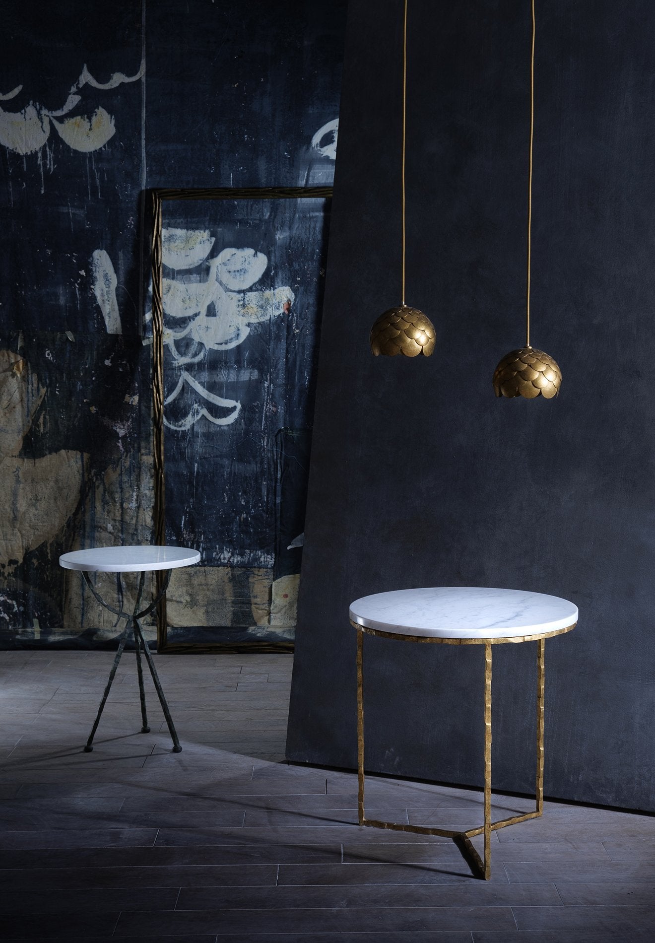 Giacometti Cocktail table in Carbon shown with Verde Fantastico top, Rose pendants in Gold and Giacometti Gamma table in Gold with Calacatta Primavera top