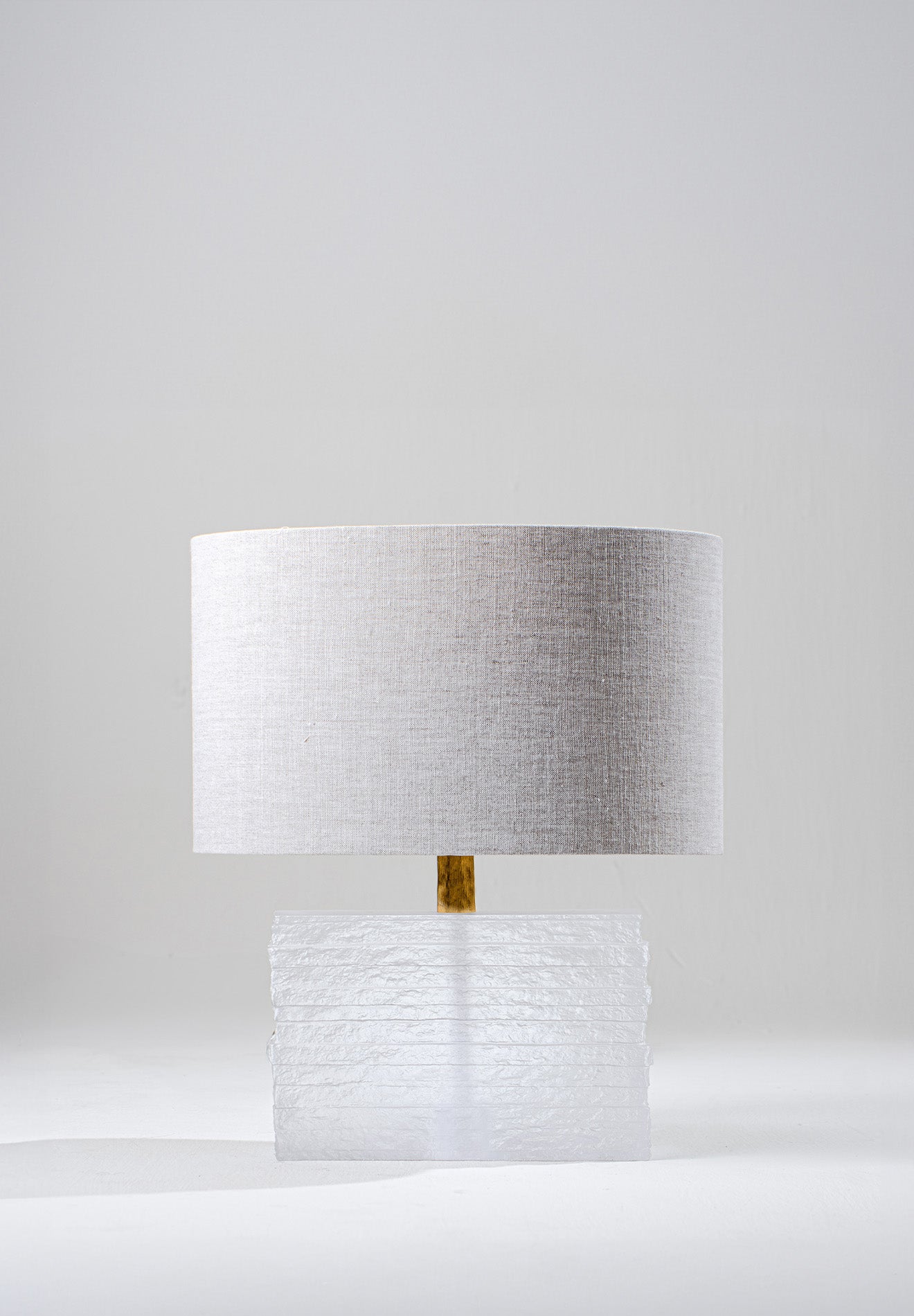 Clear shown with Antiqued Brass with 16" Straight Oval in Natural Linen with Cream Card lining